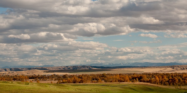 Farmland landscape with clouds